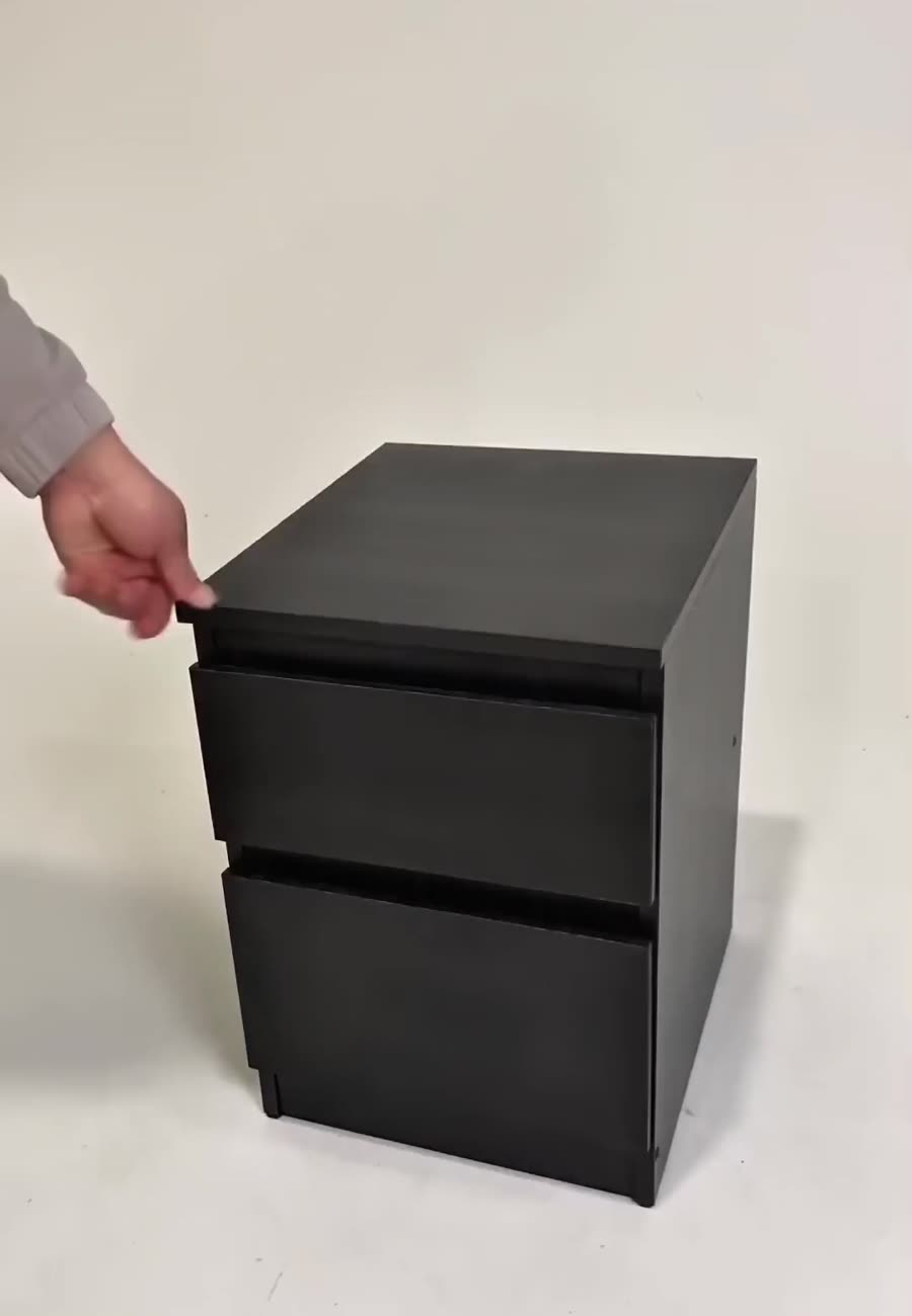 Phantom Stand nightstand opening to reveal its hidden compartment